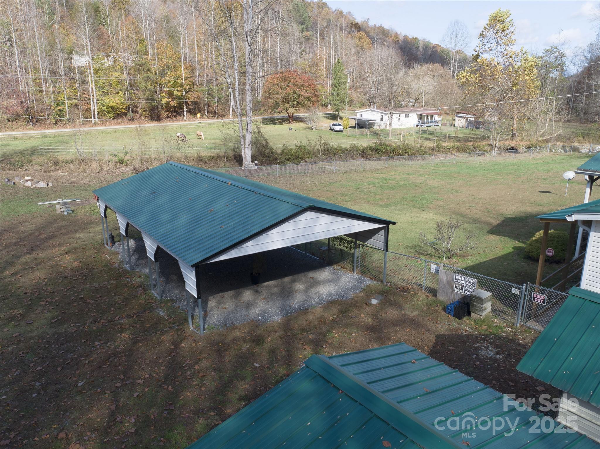 1922 Zacks Fork Road Lenoir, NC 28645 - Photo 19 of 27 a view of a terrace with wooden floor