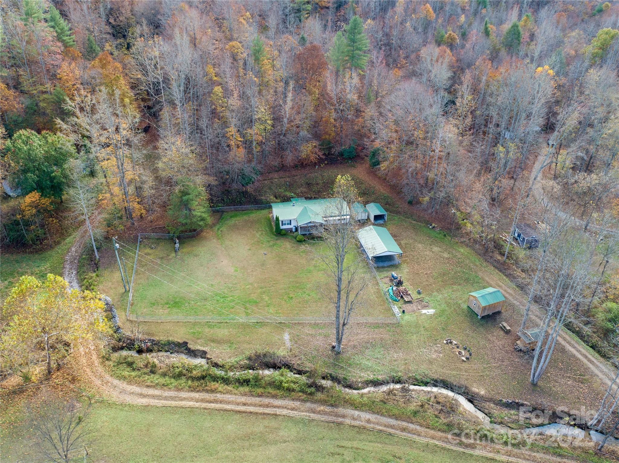 1922 Zacks Fork Road Lenoir, NC 28645 - Photo 25 of 27 a view of a house with a yard