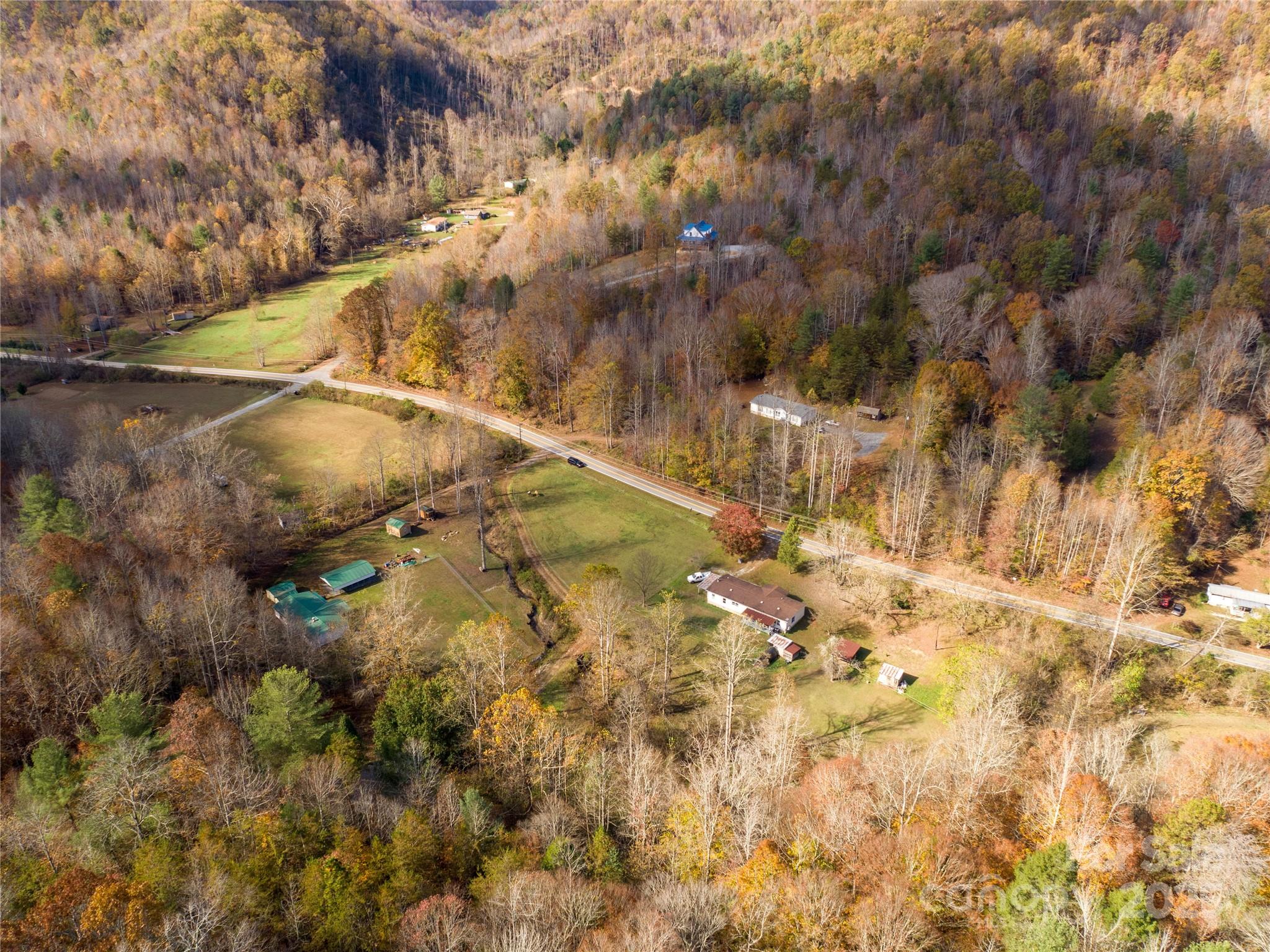 1922 Zacks Fork Road Lenoir, NC 28645 - Photo 6 of 27 a view of swimming pool next to a yard