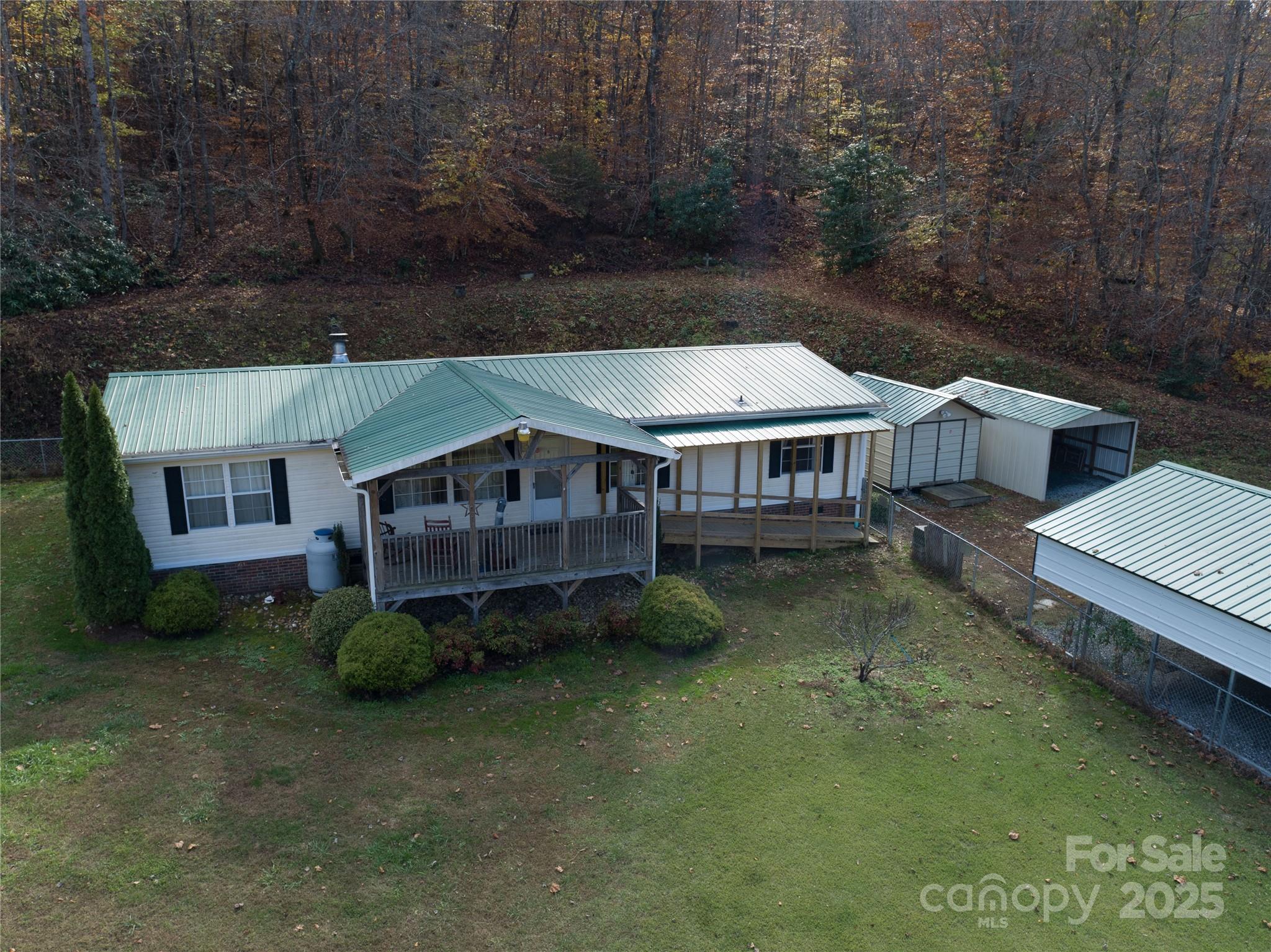 1922 Zacks Fork Road Lenoir, NC 28645 - Photo 8 of 27 a aerial view of a house with a yard