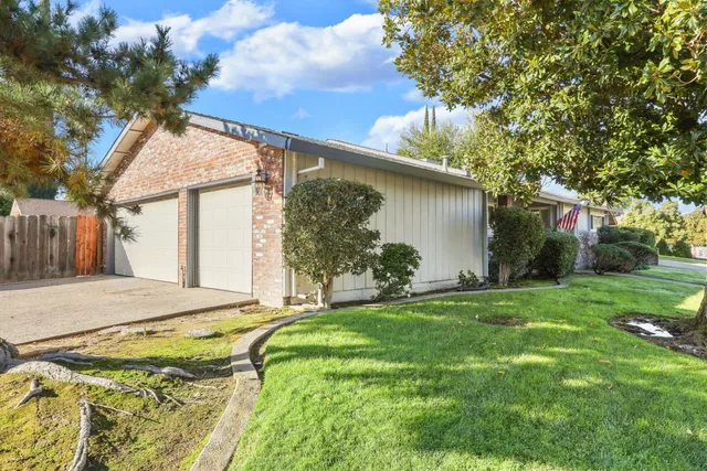 a house view with a garden space