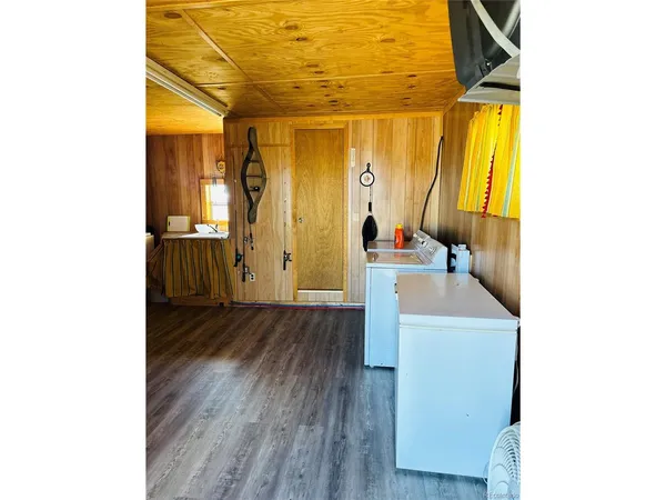 a hallway with a wooden floor