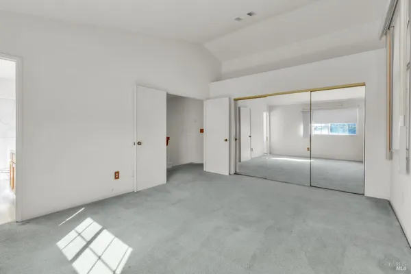 a view of an empty room with window