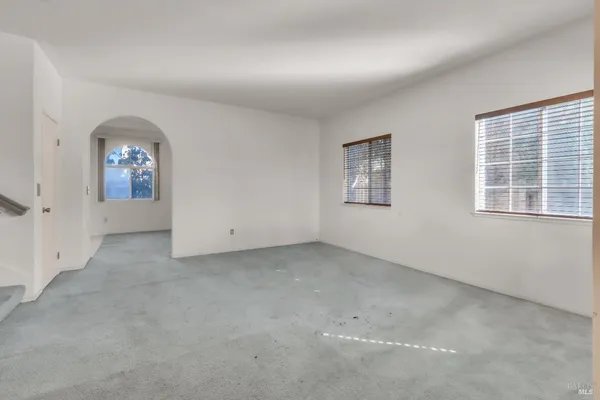 an empty room with windows