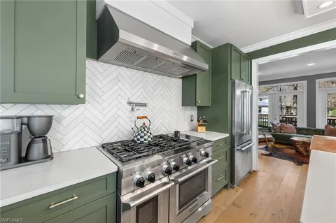 a spacious bedroom with a large bed and a window