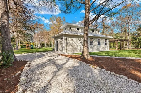 a view of a park with swings