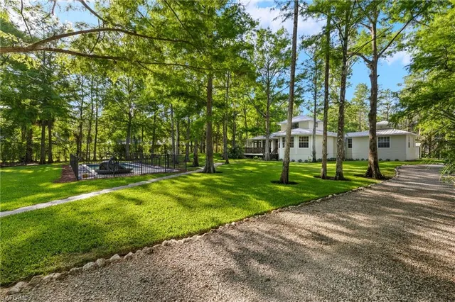 a front view of a building with street view