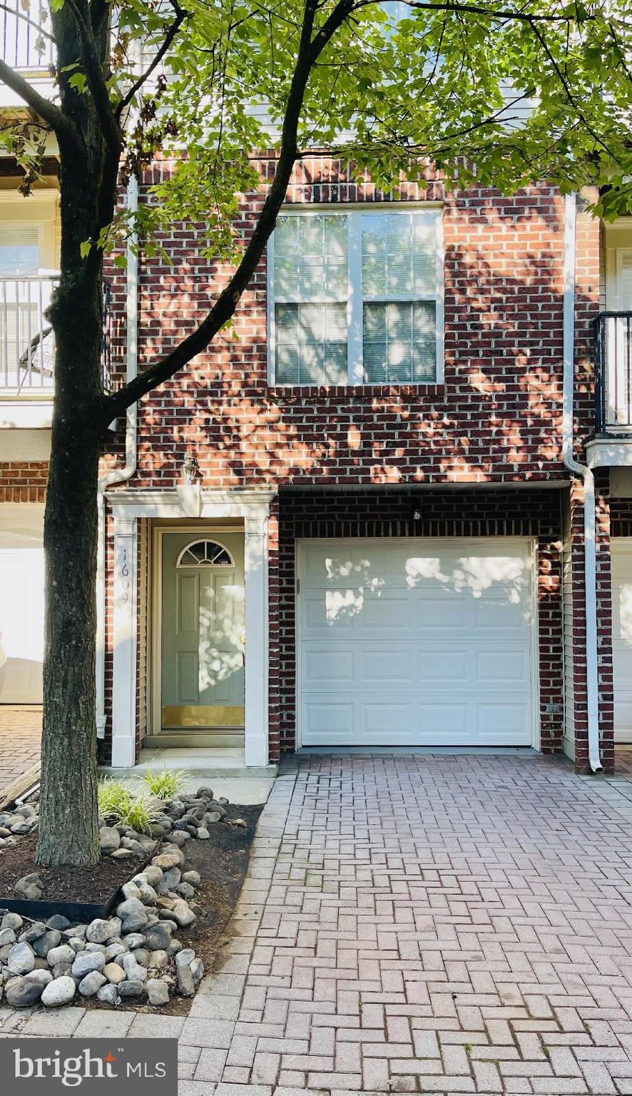 1609 Monarch Birch Way Bowie, MD 20721 - Photo 1 of 10 Brick front townhome/condo with attached garage