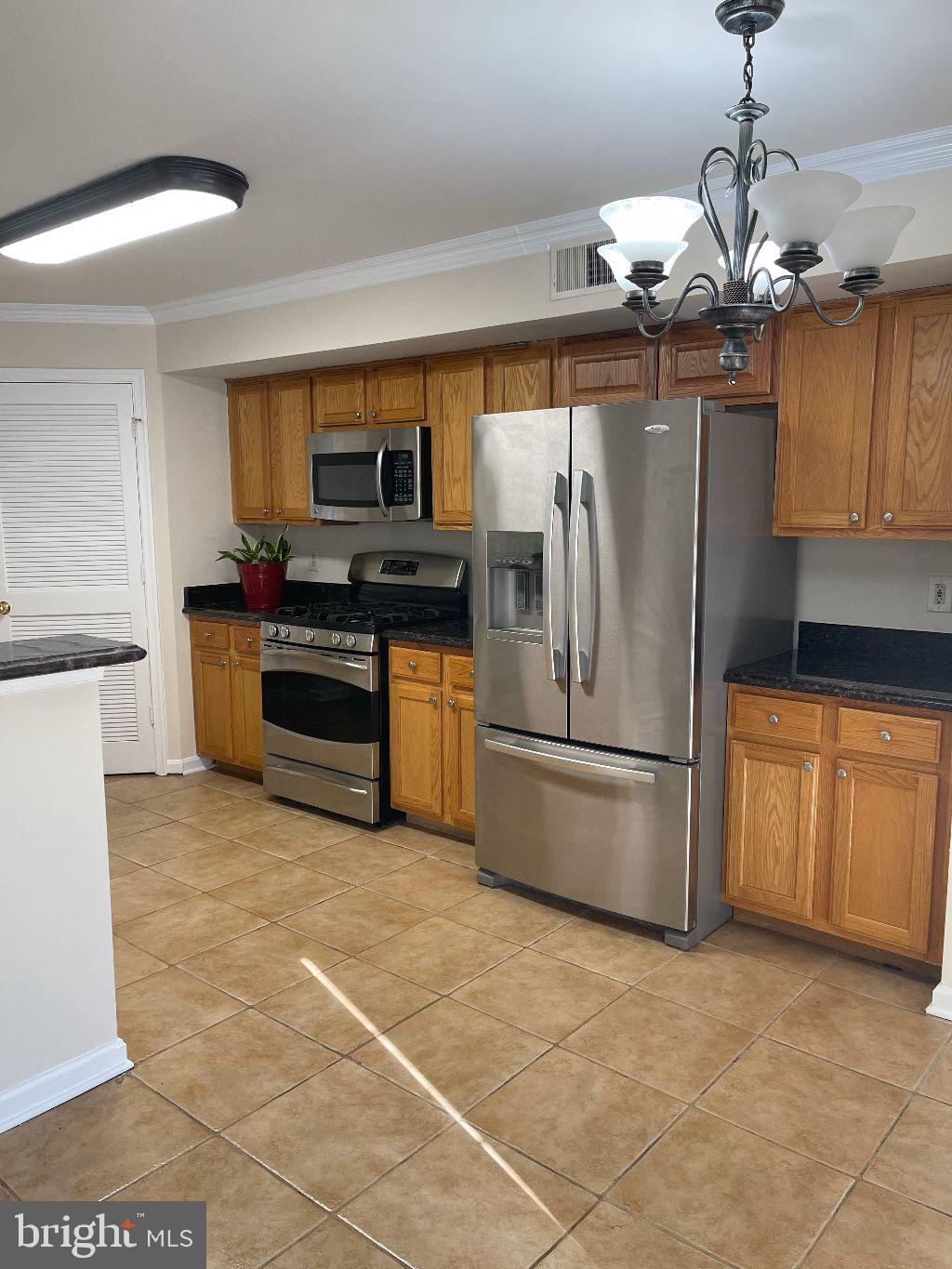 1609 Monarch Birch Way Bowie, MD 20721 - Photo 7 of 10 Open kitchen with stainless steel appliance