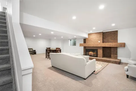 a living room with furniture and a table