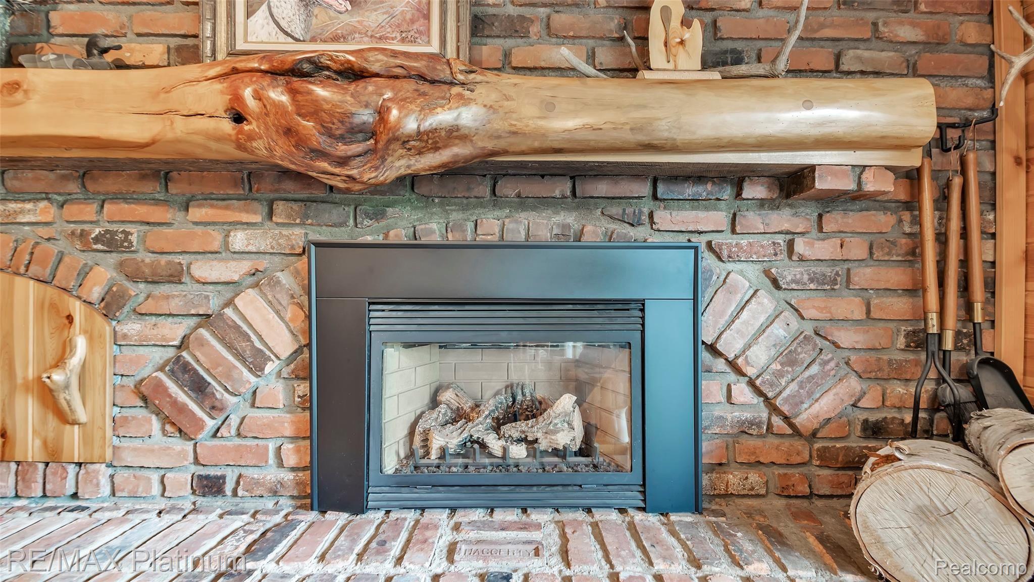 3196 Swarthout Road Pinckney, MI 48169 - Photo 24 of 44 Beautiful Brick Hearth And Gas Fireplace
