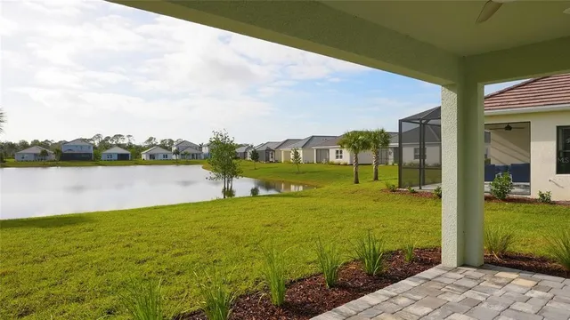 a view of a lake with a big yard