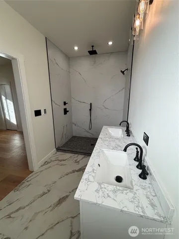 a kitchen with cabinets and appliances