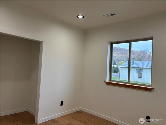 a bathroom with a bathtub and a toilet