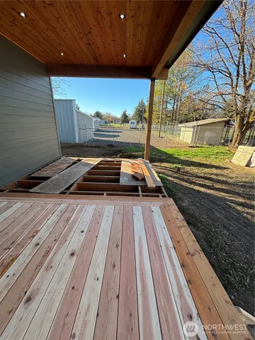 a view of swimming pool with an outdoor space and seating area
