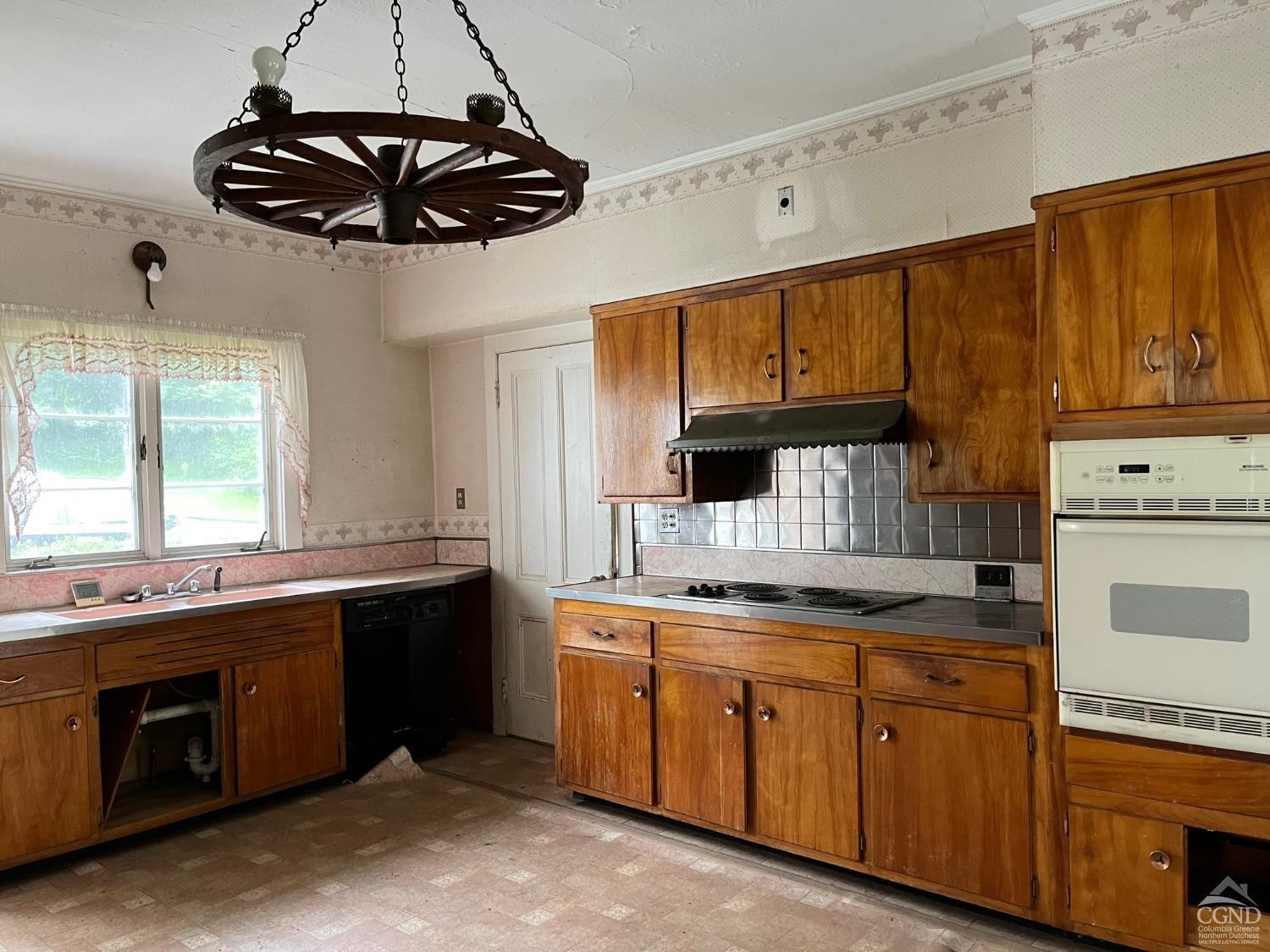 926 Smithfield Road Millerton, NY 12546 - Photo 13 of 27 a kitchen with kitchen island granite countertop a sink stainless steel appliances and cabinets