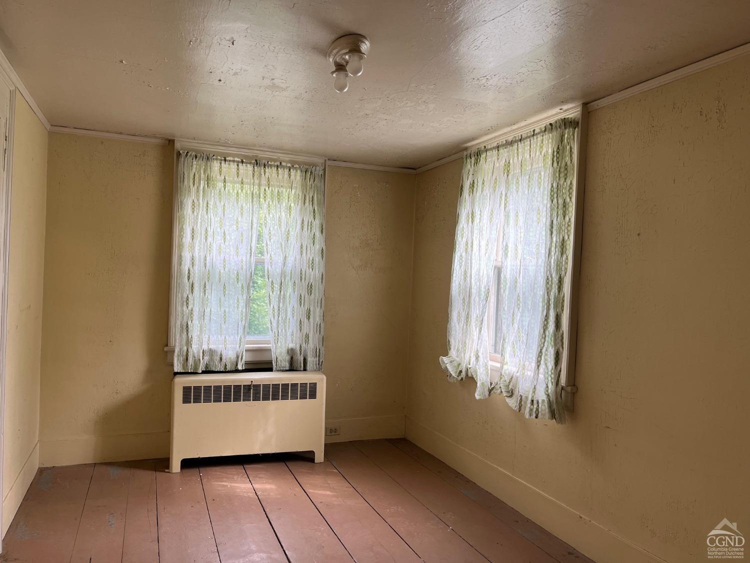 926 Smithfield Road Millerton, NY 12546 - Photo 14 of 27 a room with window and wooden floor