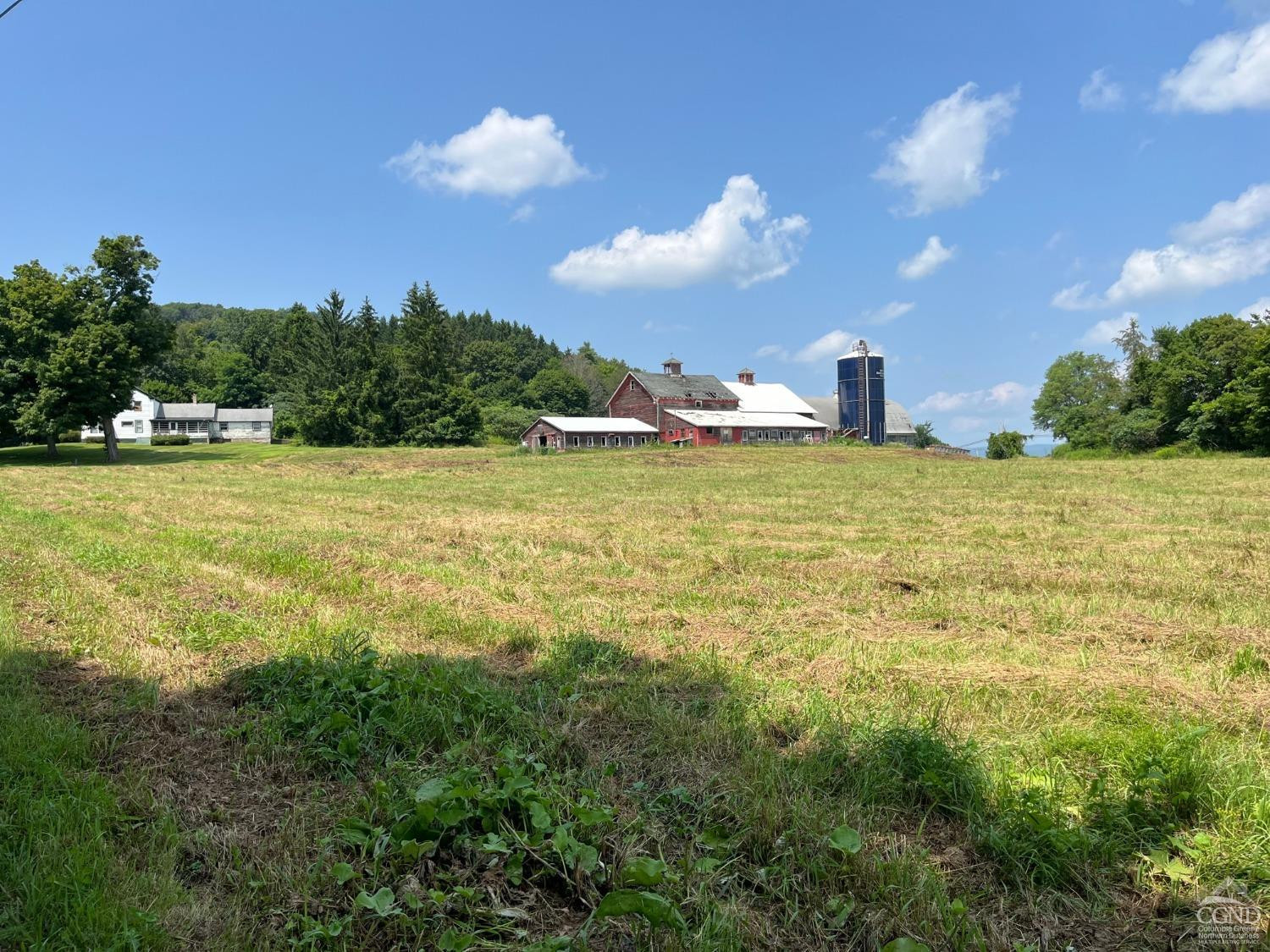 926 Smithfield Road Millerton, NY 12546 - Photo 17 of 27 a view of a big yard with an outdoor space and seating area