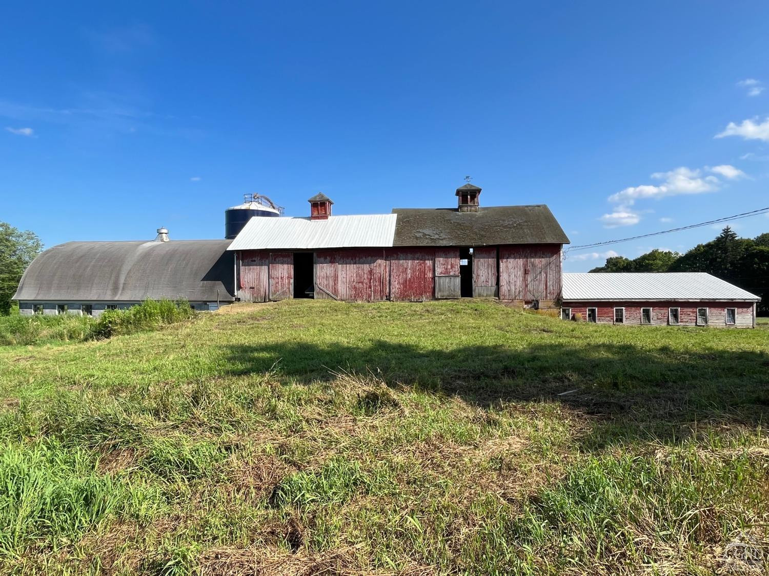 926 Smithfield Road Millerton, NY 12546 - Photo 20 of 27 a front view of a house with garden