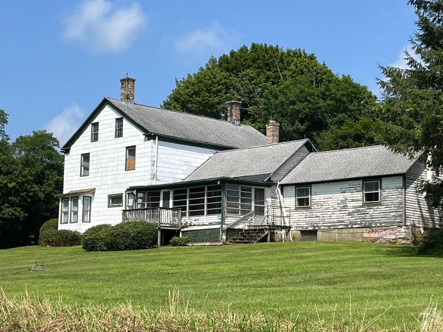 926 Smithfield Road Millerton, NY 12546 - Photo 2 of 27 a front view of a house with a garden
