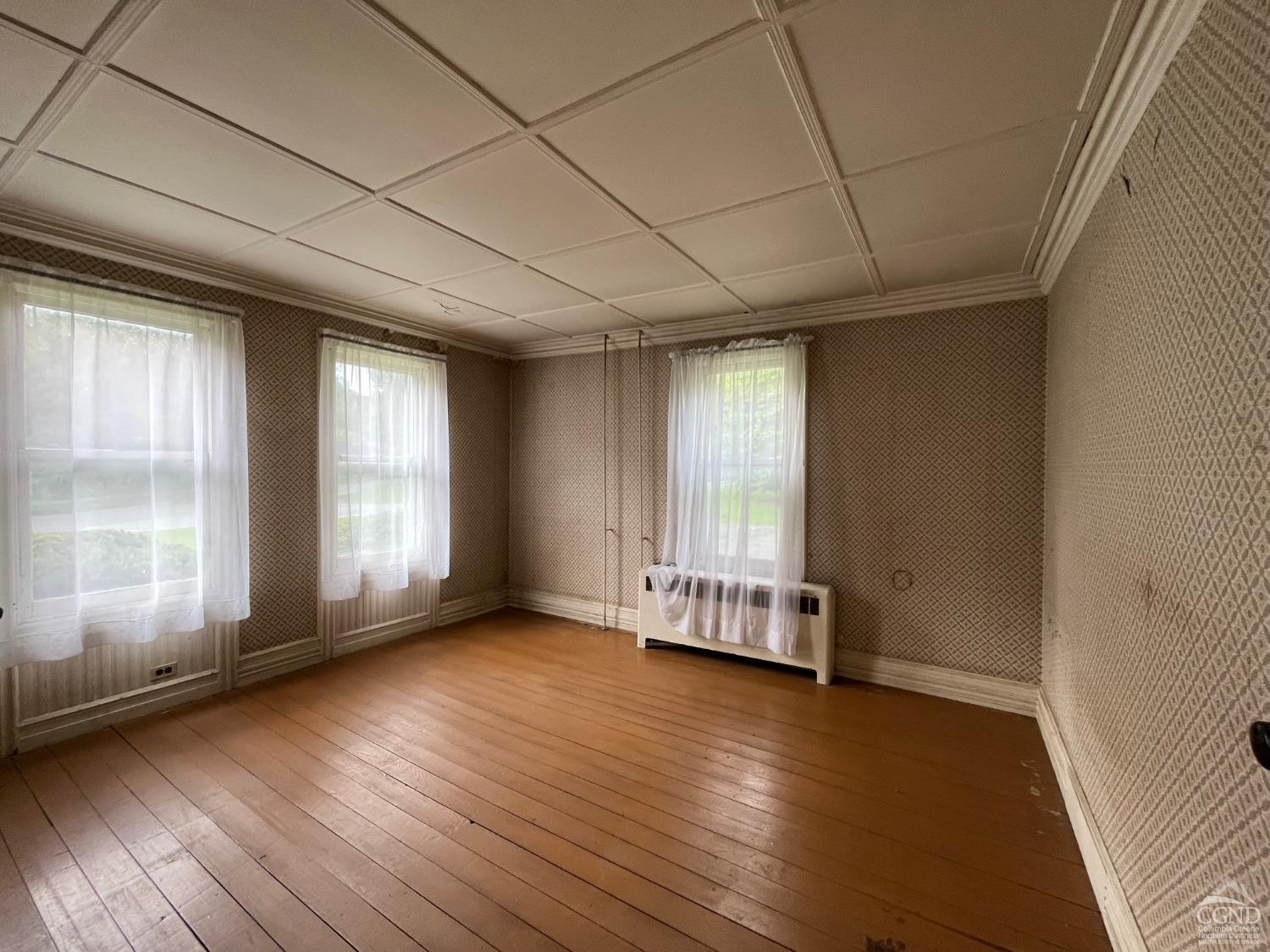 926 Smithfield Road Millerton, NY 12546 - Photo 21 of 27 wooden floor in an empty room with a window