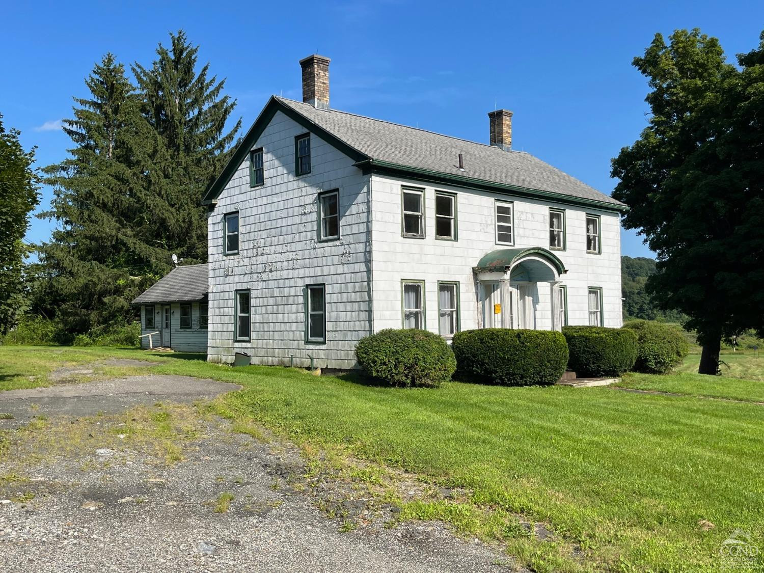 926 Smithfield Road Millerton, NY 12546 - Photo 4 of 27 a front view of a house with a yard