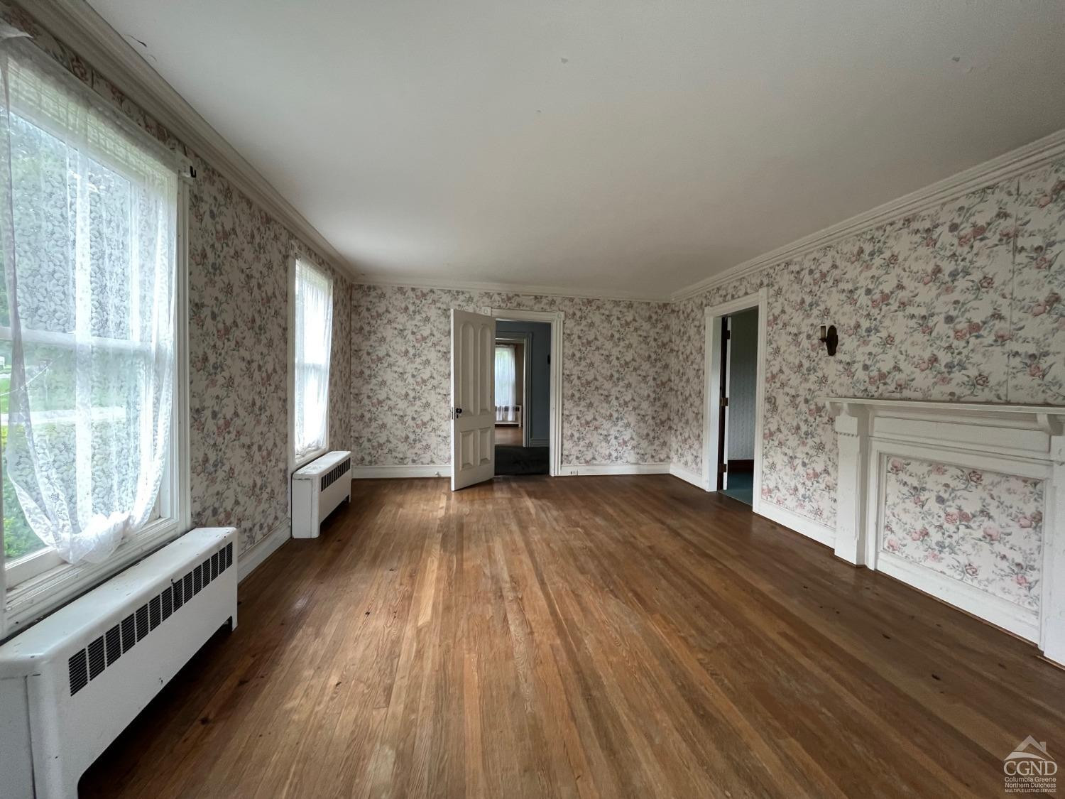 926 Smithfield Road Millerton, NY 12546 - Photo 10 of 27 a view of an empty room with wooden floor and a window