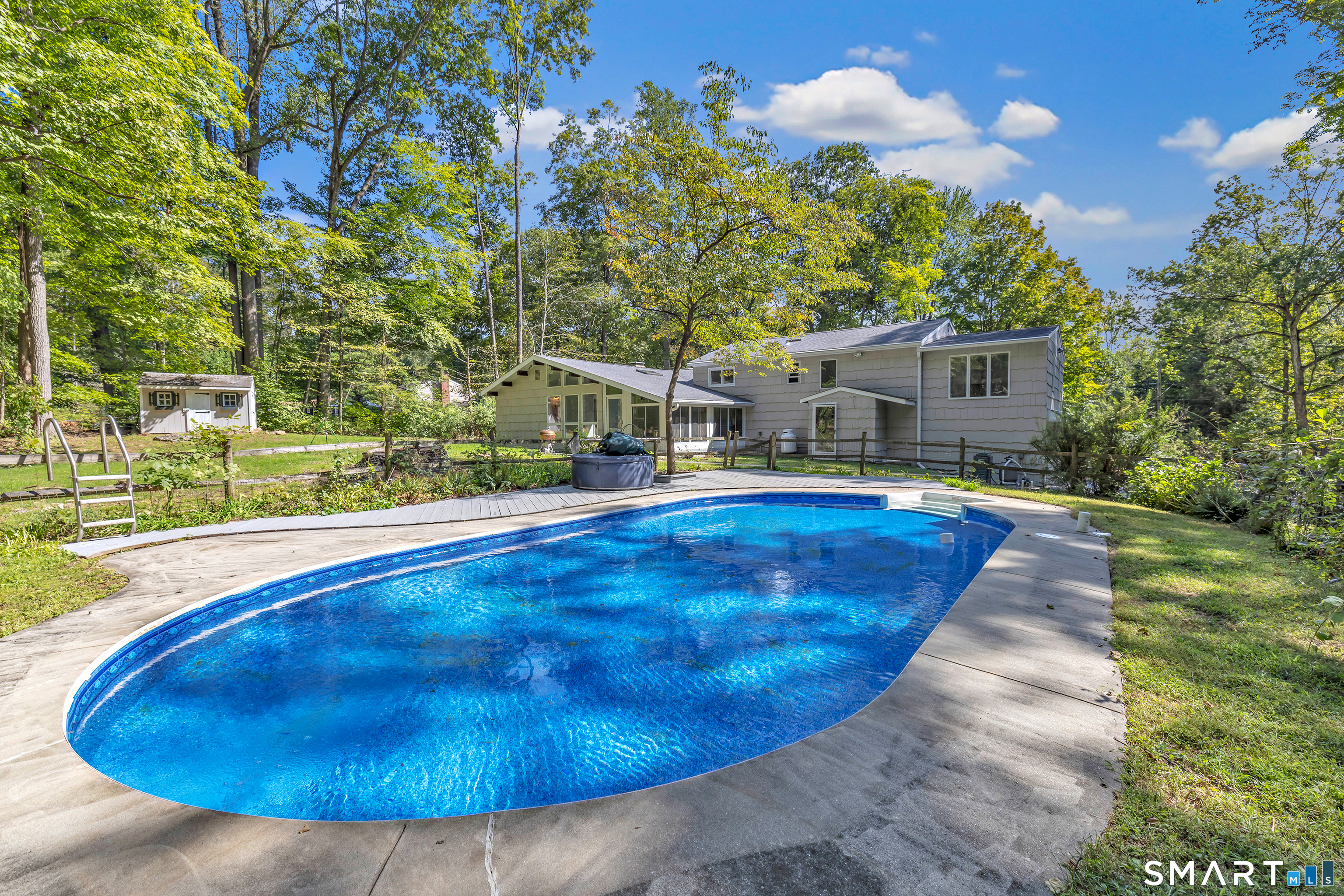 48 Crestwood Road Monroe, CT 06468 - Photo 7 of 32 a view of a house with swimming pool