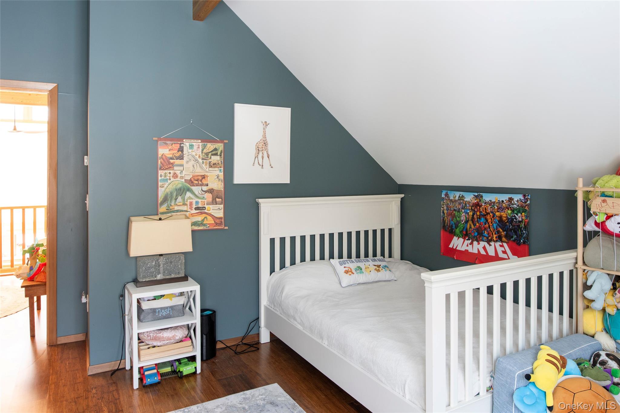 195 Vlei Road Rhinebeck, NY 12572 - Photo 18 of 25 a bedroom with furniture and a wooden floor