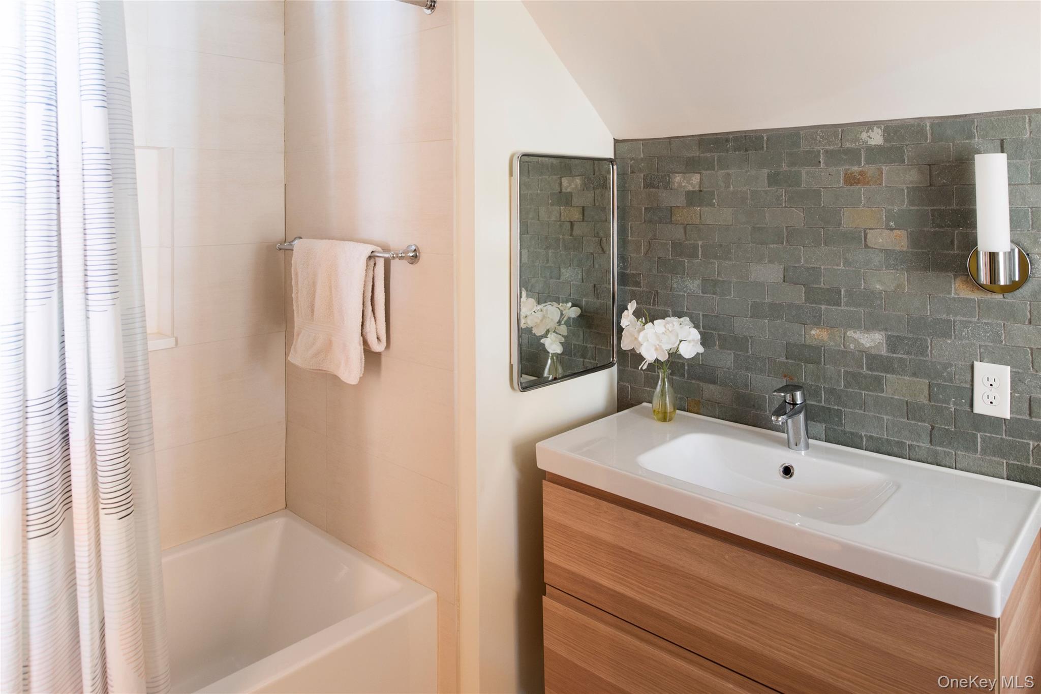 195 Vlei Road Rhinebeck, NY 12572 - Photo 19 of 25 a bathroom with a sink and mirror