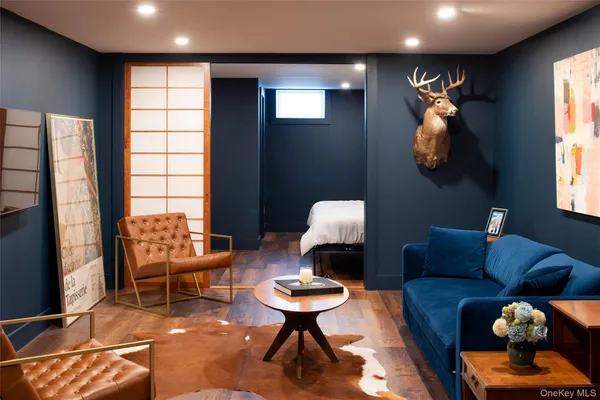 a bedroom with a bed and lamps