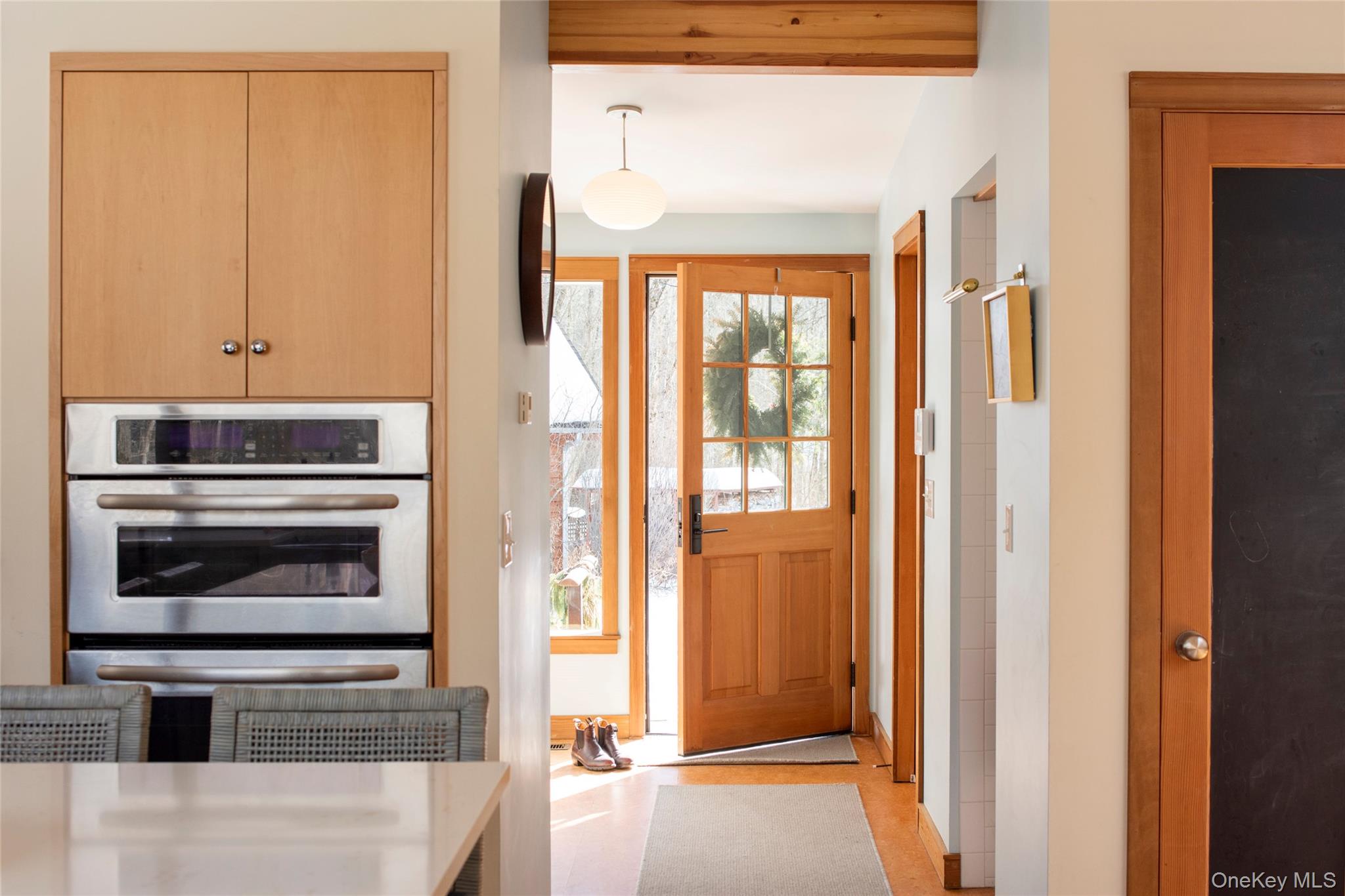 195 Vlei Road Rhinebeck, NY 12572 - Photo 2 of 25 a kitchen with a refrigerator and window