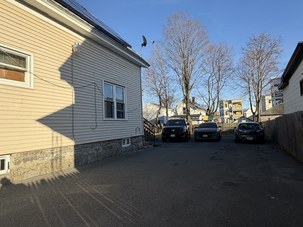28-32 Chester Street Lawrence, MA 01843 - Photo 30 of 30 a view of a street with cars on road
