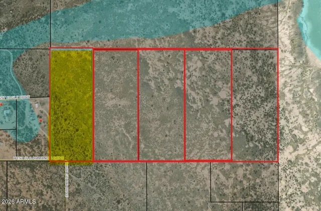 a view of a wooden fence