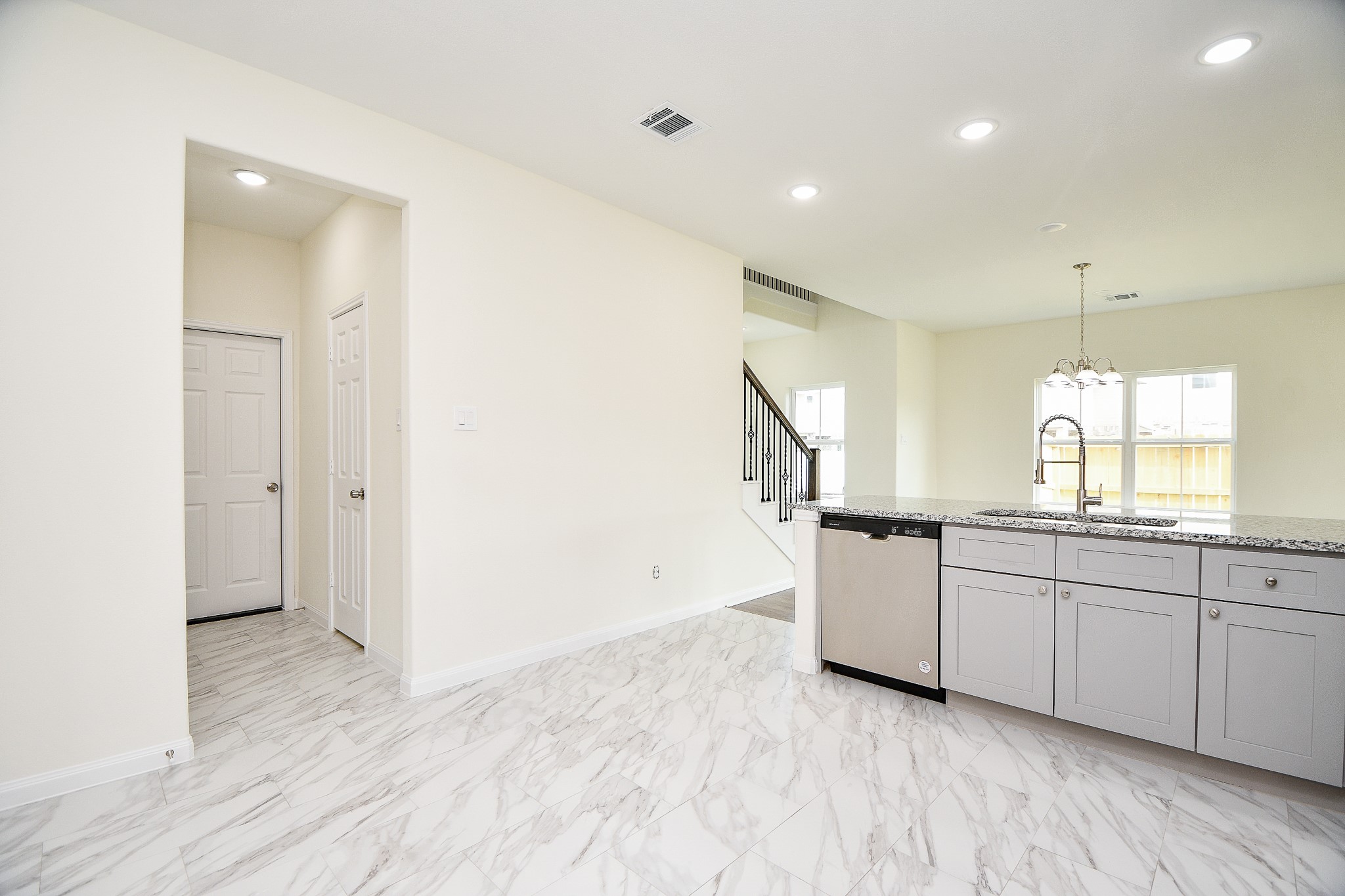 2803 Bowlin Leaf Lane Houston, TX 77014 - Photo 13 of 28 a large white kitchen with a sink