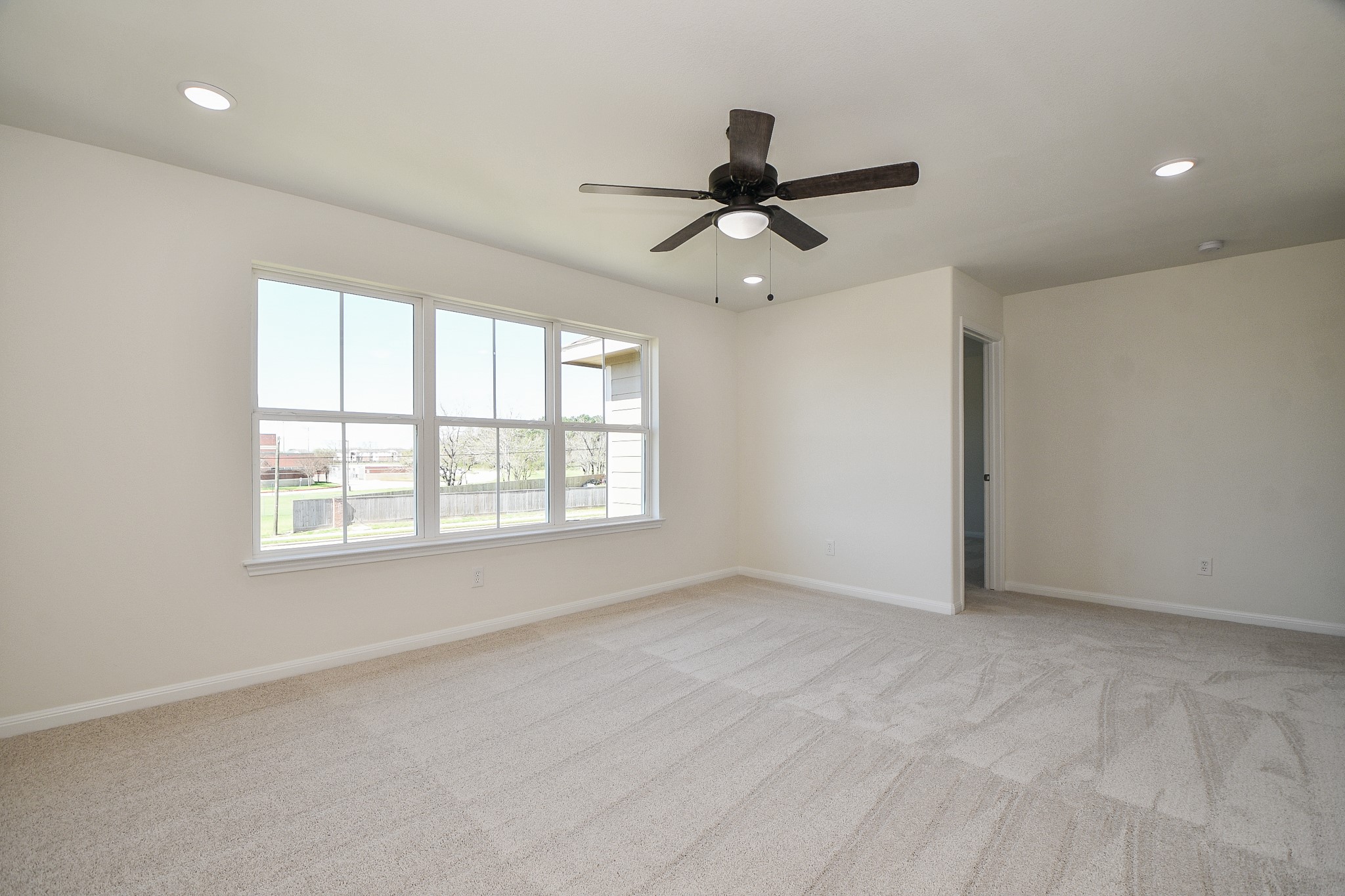 2803 Bowlin Leaf Lane Houston, TX 77014 - Photo 19 of 28 a view of an empty room with a window