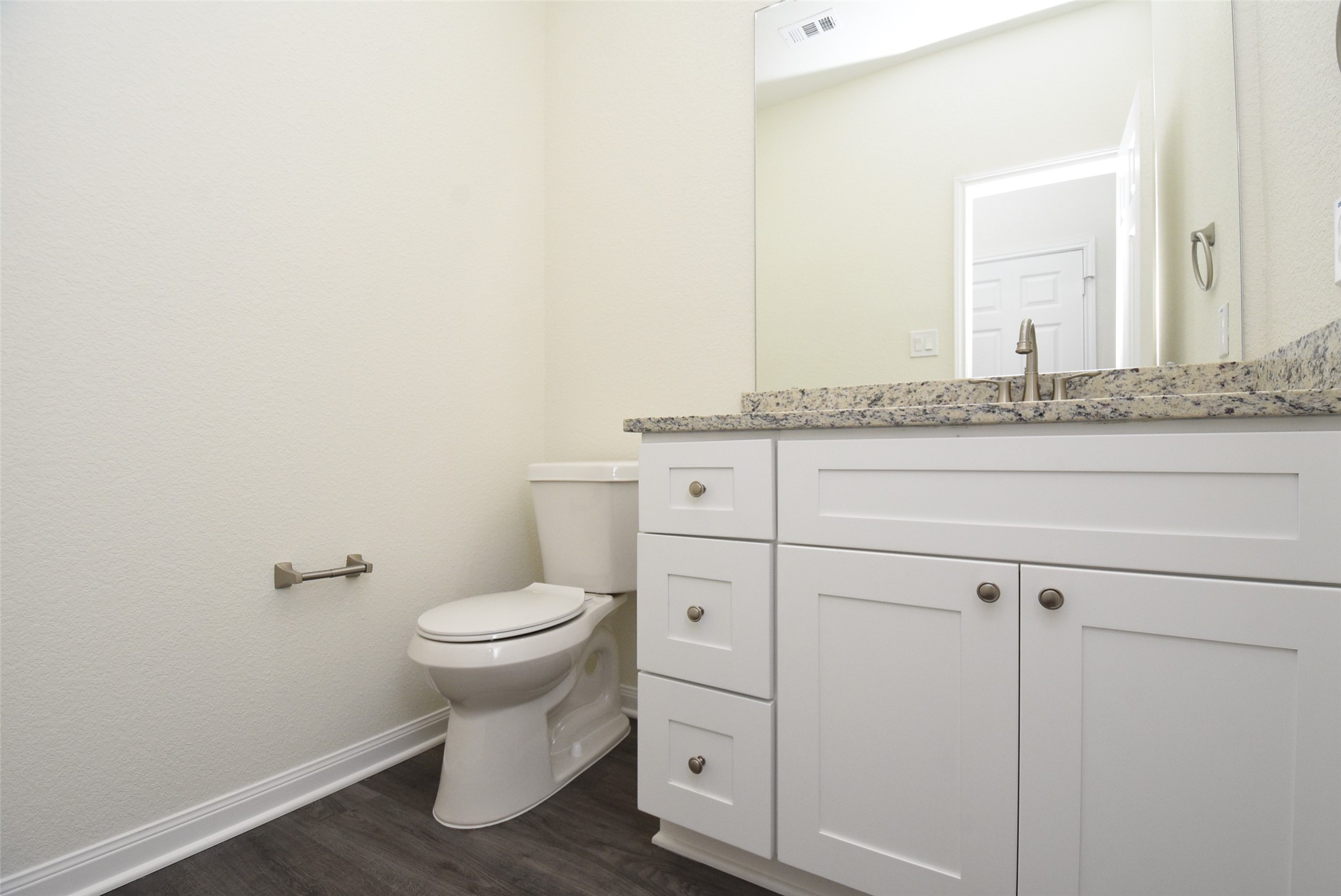 2803 Bowlin Leaf Lane Houston, TX 77014 - Photo 23 of 28 a bathroom with a toilet sink and mirror