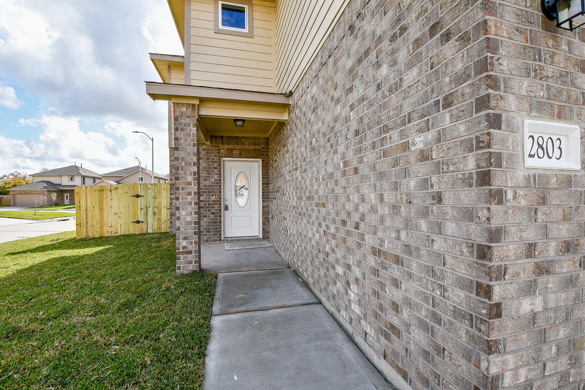 2803 Bowlin Leaf Lane Houston, TX 77014 - Photo 5 of 28 a view of a pathway both side of brick house