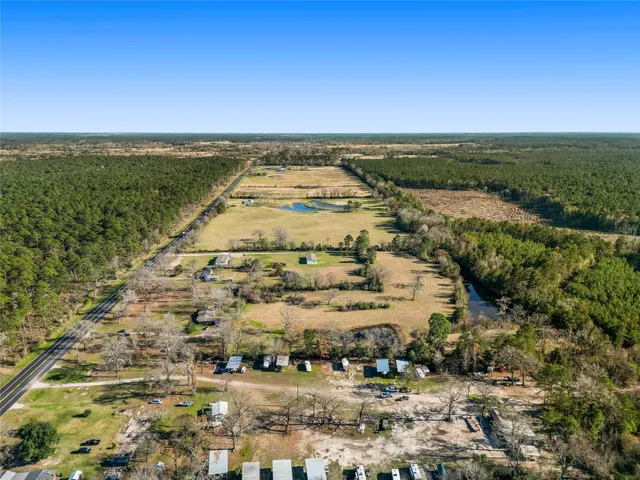 a view of an ocean beach and city
