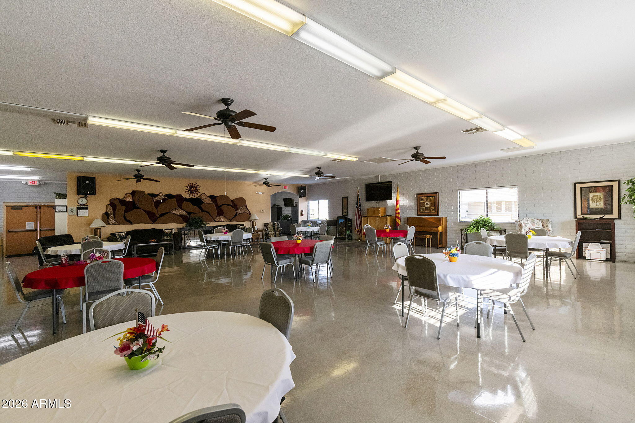 3700 South Tomahawk Road, Unit 73 Apache Junction, AZ 85119 - Photo 42 of 49 a group of people sitting in a room