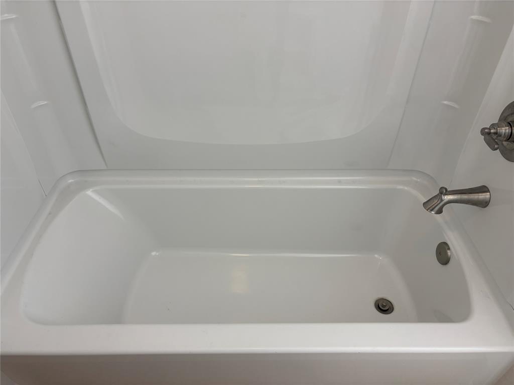 3601 Slade Boulevard Fort Worth, TX 76116 - Photo 9 of 14 a bathroom with a bathtub