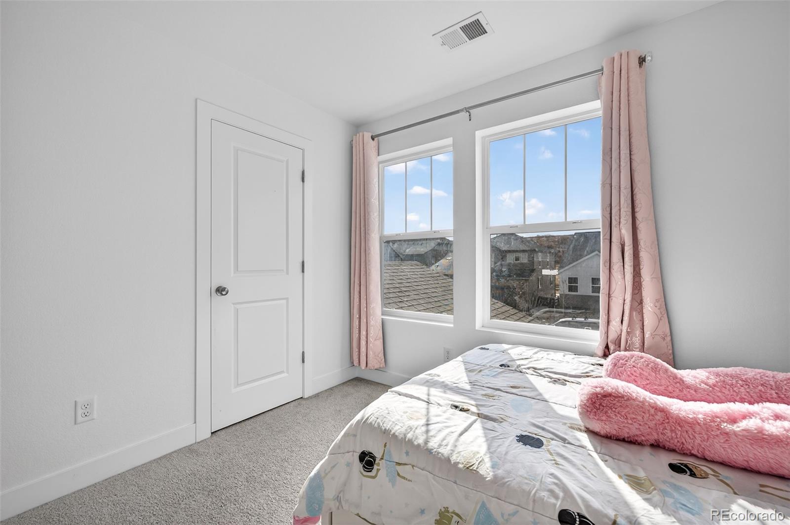 3649 Rucksack Court Castle Rock, CO 80108 - Photo 32 of 48 a bedroom with a bed and a window