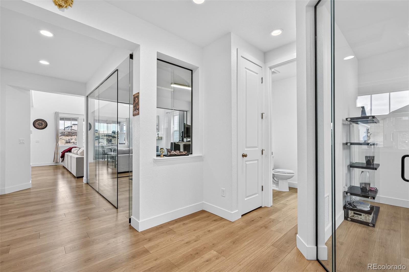 3649 Rucksack Court Castle Rock, CO 80108 - Photo 4 of 48 a view of entryway with wooden floor