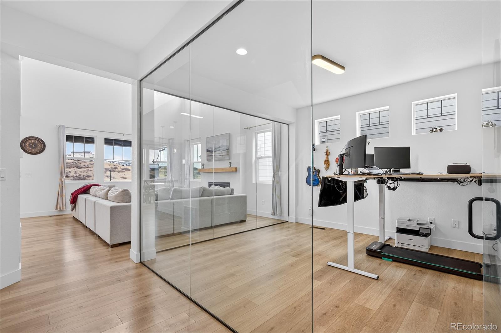 3649 Rucksack Court Castle Rock, CO 80108 - Photo 6 of 48 a room with lots of furniture and white walls