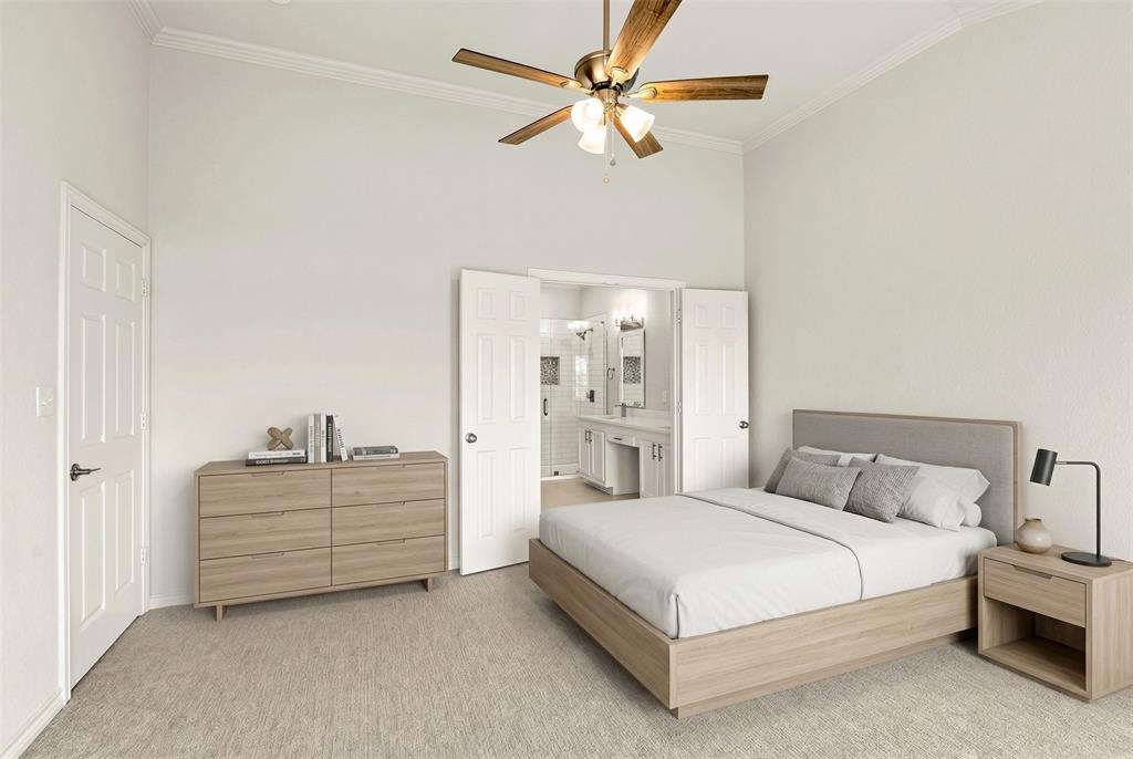 1916 Signal Ridge Place Rockwall, TX 75032 - Photo 14 of 32 Virtually staged Bedroom featuring light carpet, ensuite bath, a high ceiling, crown molding, and ceiling fan