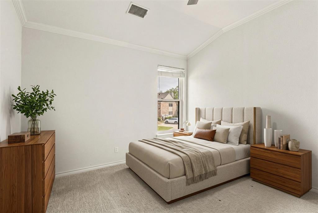 1916 Signal Ridge Place Rockwall, TX 75032 - Photo 16 of 32 Virtually staged Bedroom featuring lofted ceiling, light colored carpet, ceiling fan, and ornamental molding