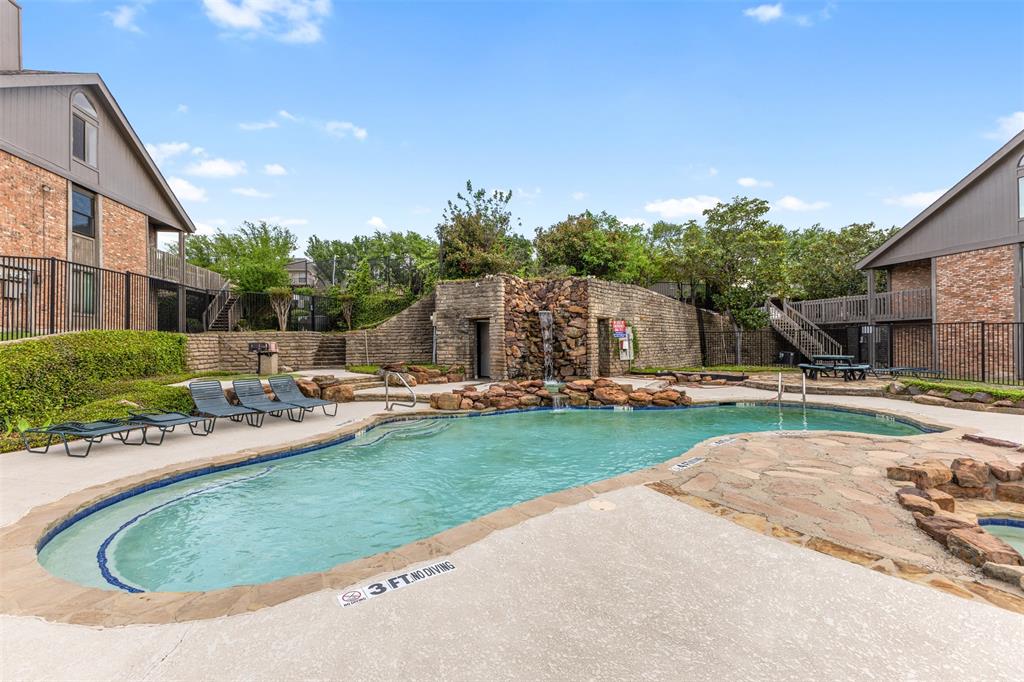 1916 Signal Ridge Place Rockwall, TX 75032 - Photo 28 of 32 Community pool with a patio and stairway