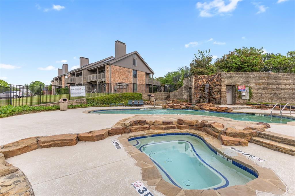1916 Signal Ridge Place Rockwall, TX 75032 - Photo 29 of 32 Community pool featuring a community hot tub and a patio area
