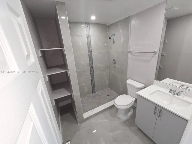 a view of a backyard of the house