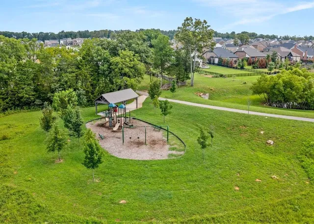 a view of a garden with a lake